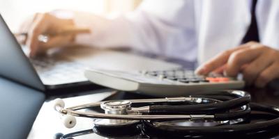 Photo of doctor at a laptop