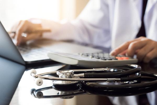 Photo of doctor at a laptop